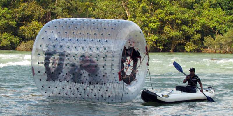 Water Roller - Dandeli Fun Activity Water roller zorbing activity on Kali River for fun water experience in Dandeli
