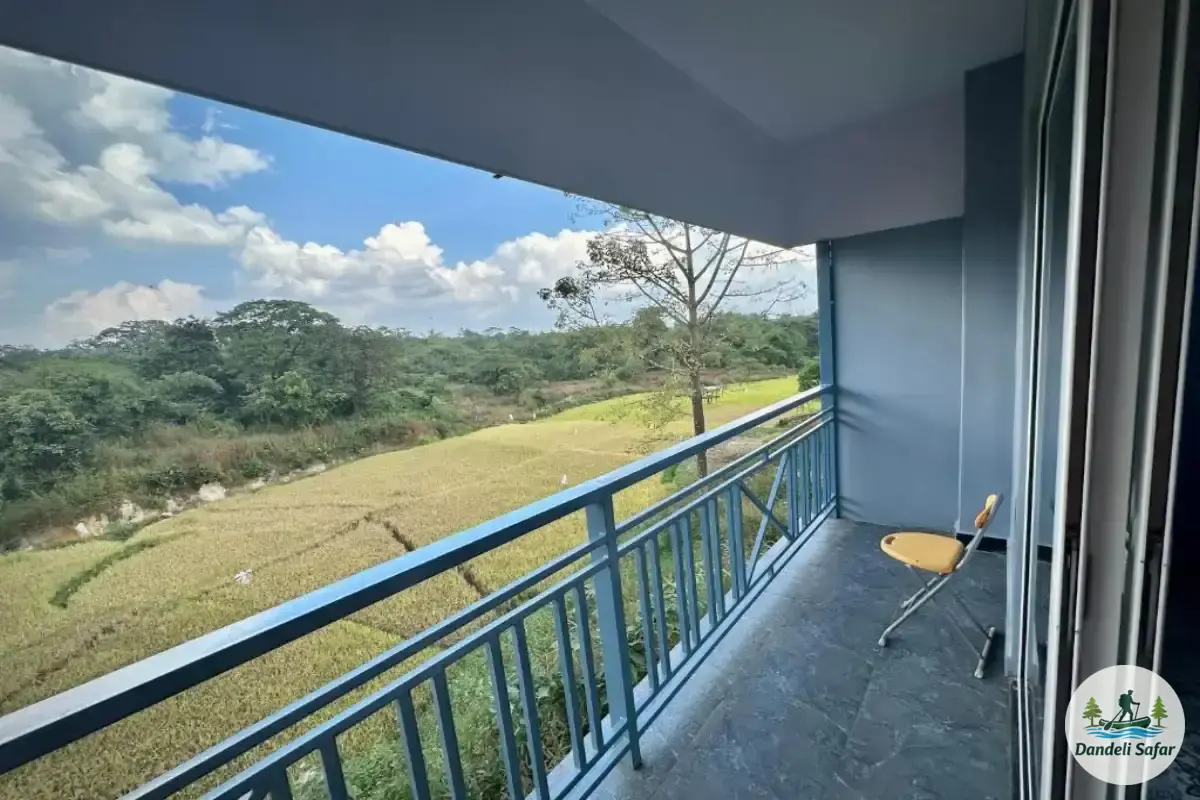 AC Deluxe cottage with private balcony overlooking gardens at B Hive Resort