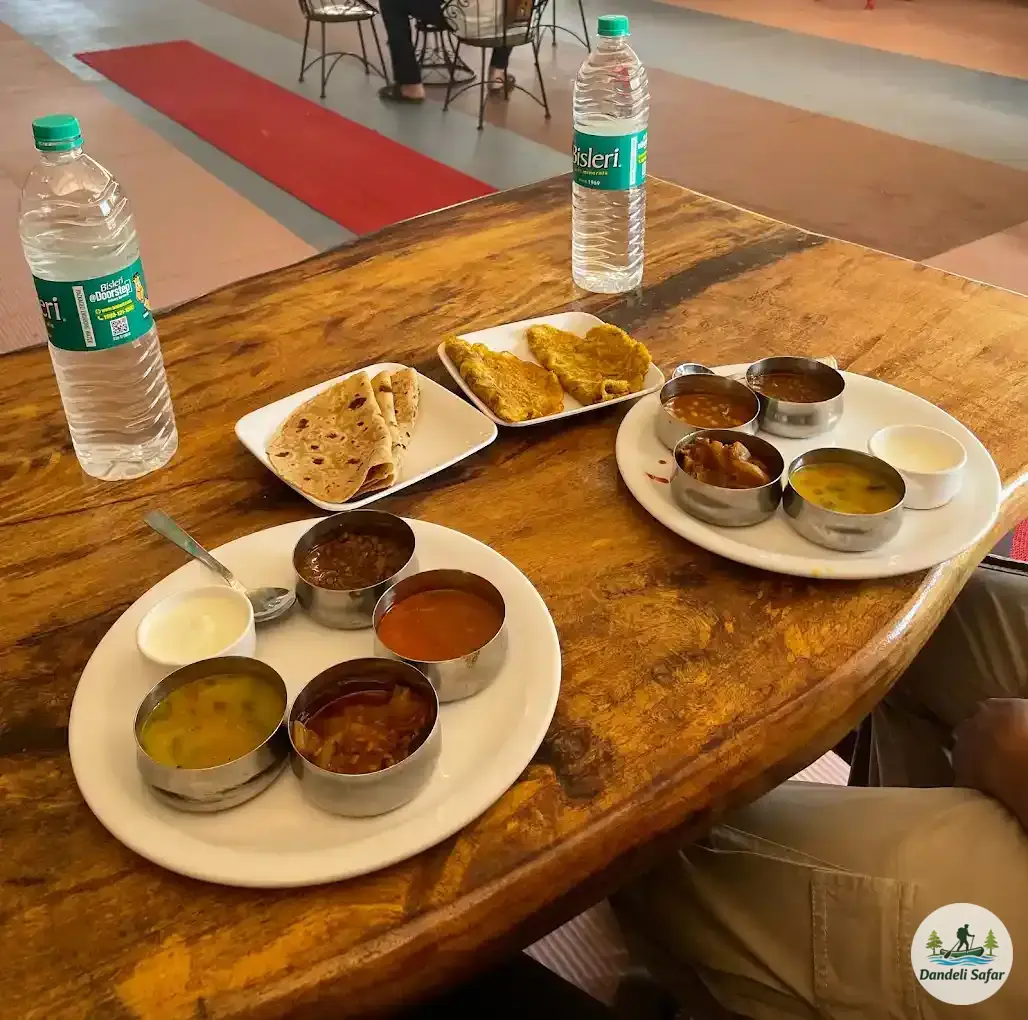 Delicious breakfast spread with variety of dishes at B Hive Resort Londa