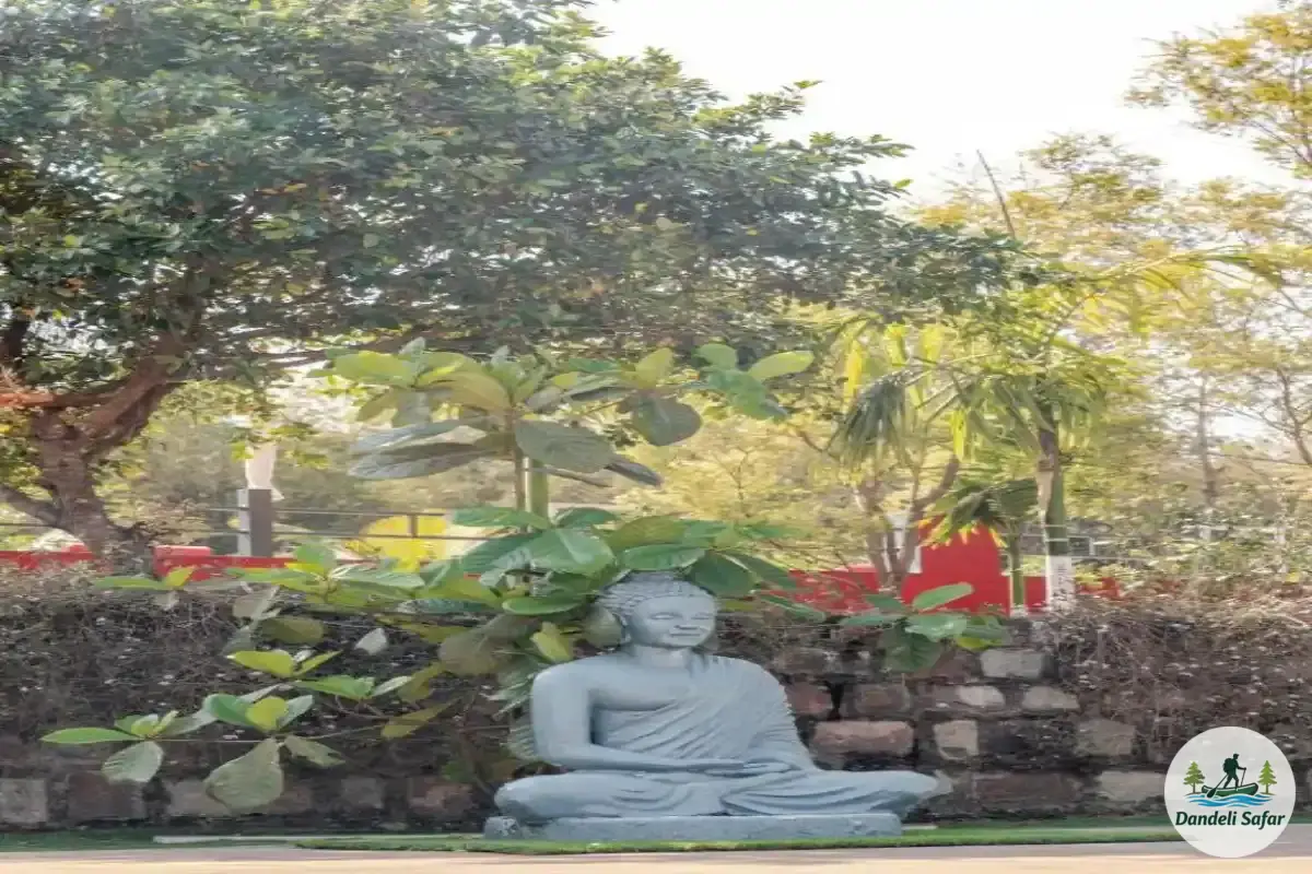 Buddha statue in peaceful garden setting at B Hive riverside resort