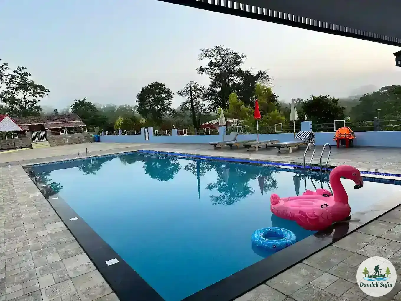 Stunning sunset view over swimming pool at B Hive riverside resort Londa