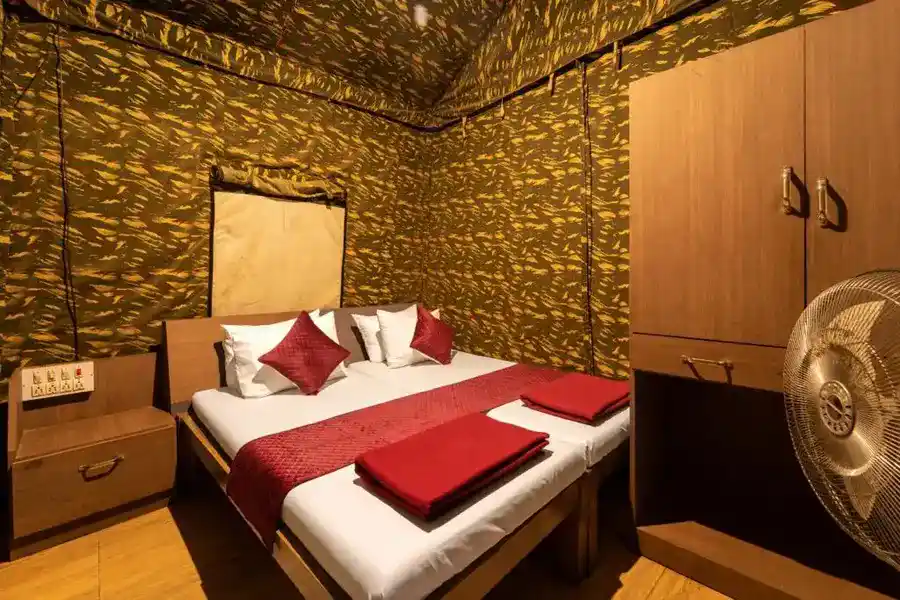 Comfortable commando tent interior for 2 guests camping at Dew Drops Resort