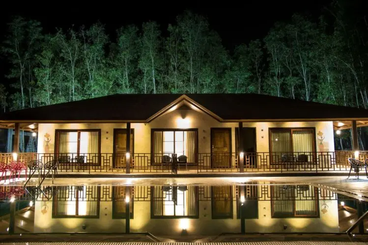 Beautiful exterior view of Dew Drops Jungle Resort building and architecture