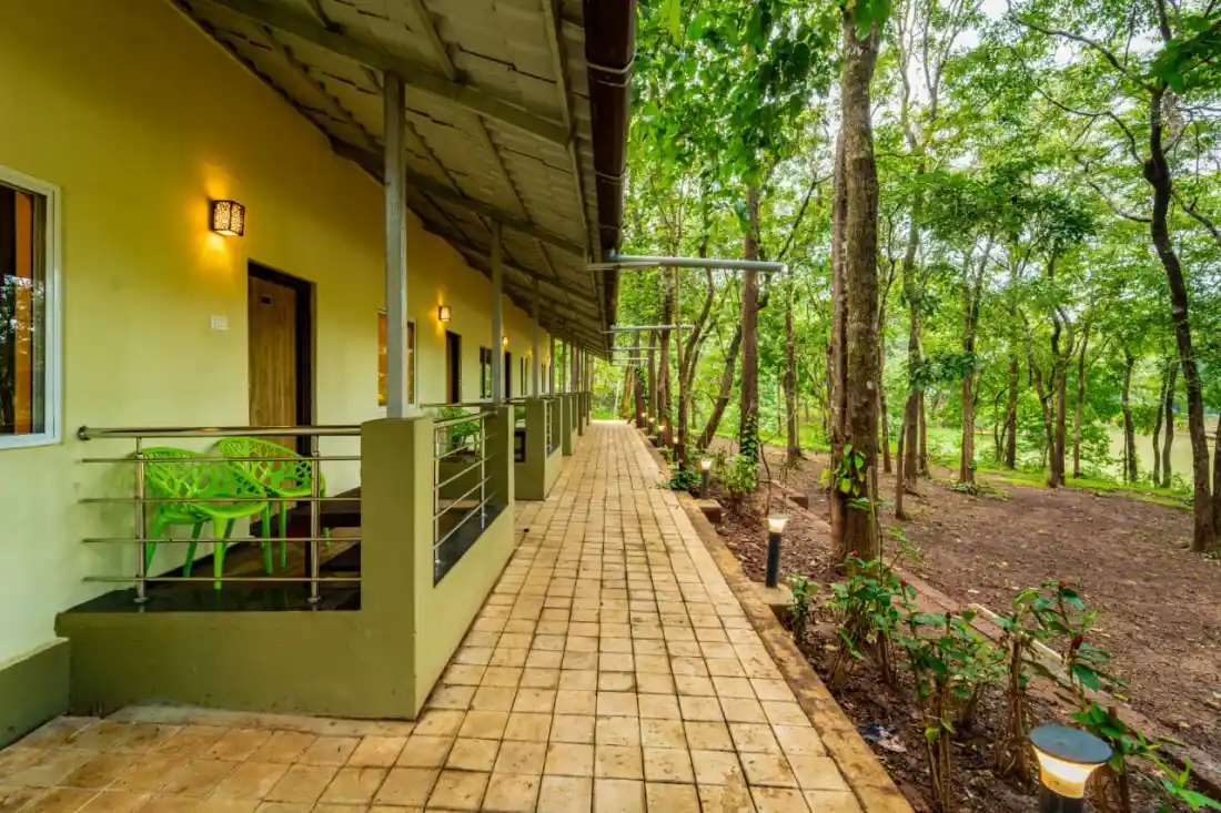 Cottage corridor with forest view at Rain Forest Resort near Ganeshgudi