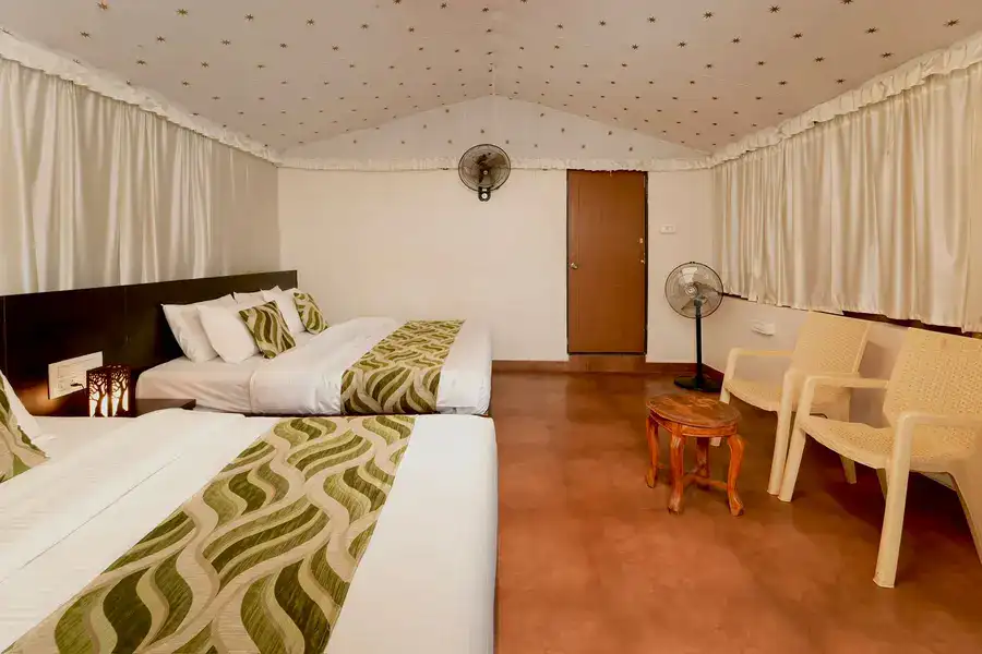 Elegant interior of Maharaja cottage with modern amenities at Tusker Trails