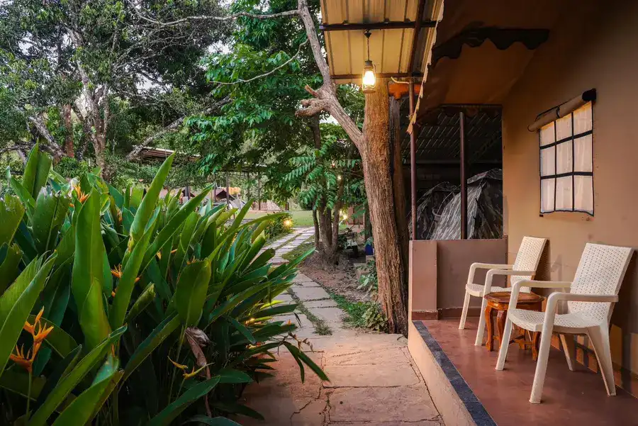 Private veranda of Maharaja cottage perfect for relaxation at Tusker Trails