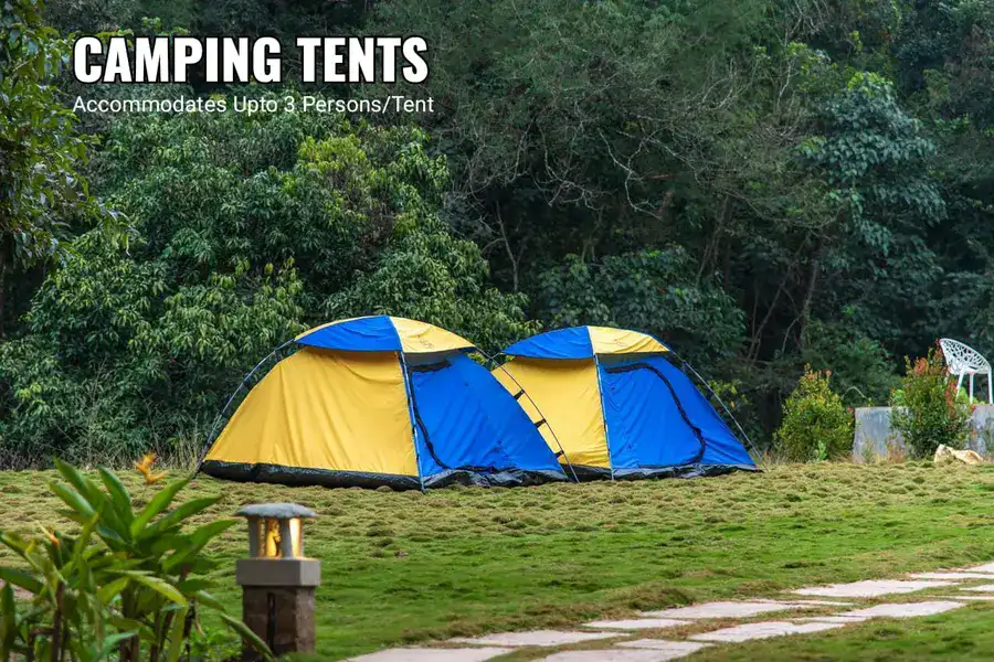 Adventure camping tents set in beautiful garden area at Tusker Trails