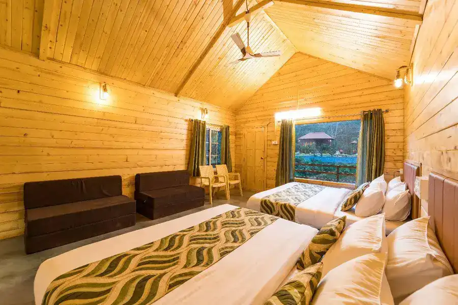 Cozy wooden cottage interior with traditional decor at Tusker Trails
