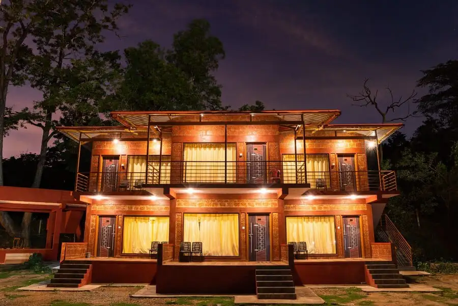 Night-time ambiance at Wild Wings Dandeli with warm lights and greenery